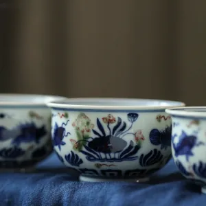 Gohobi Hand-painted Wood-fired Red, Blue and White Fish Yongle Hand-pressed Tea Cup