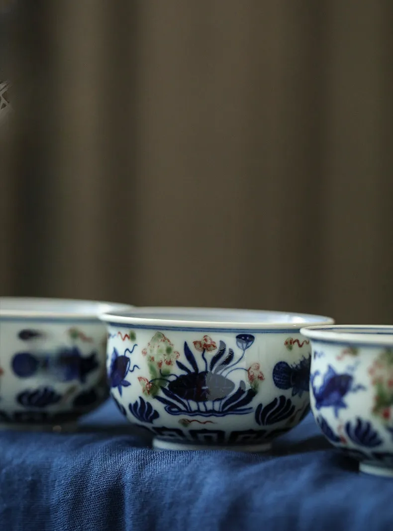 Gohobi Hand-painted Wood-fired Red, Blue and White Fish Yongle Hand-pressed Tea Cup